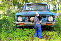 1-5, boy, "christine lewis photography", junkyard, kids, little, old, photographer, pictures, portraits, professional, three, years, blue truck, green weeds, looking at the hood