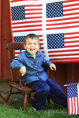 child, portraits, professional, chattanooga, tn, tennessee, patriotic, red, white, blue, american flag, quilt, clothes line, boy, pictures, photographs, four year old, rocking chair