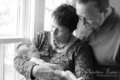 newborn, chattanooga, tennessee, girl, pink, baby, infant, professional photo shoot, photographs, pictures, awake, eyes open, grandmother, father, daughter, window, black and white