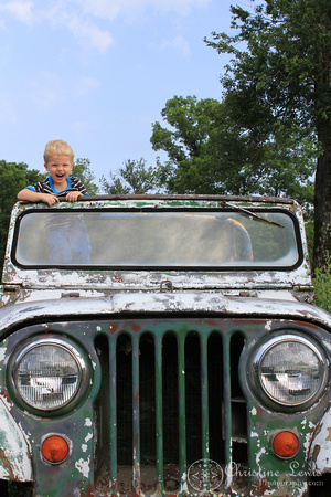 children photo shoot, professional, portraits, pictures, chattanooga, tennessee, tn, &quot;christine lewis photography&quot;, junkyard, vintage, antique cars, 3 years old, boy, playing, jeep, smiling