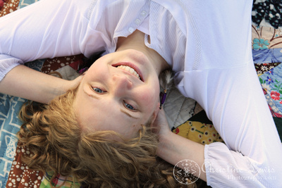 chattanooga, tennessee, senior portraits, home school, christine lewis photography, curly, blonde, girl, female, photographs, from above, quilt, family heirloom