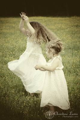 girls, yellow flowers, wildflowers, field, green, vintage, dresses, curly, brown hair, children, artistic, portraits, photographs, pictures, chattanooga, tennessee, tn, twirling