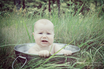 baby photography, dayton, tn, tennessee, photographs, portraits, pictures, professional, 6 month old, girl, baby, outdoor, natural, tall grass, tub, bubble bath, sad, upset