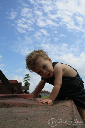 boy, 18 month sold, tractor, overalls, blue sky, playing, portrait