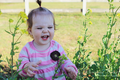 spring, yellow, green, turnip greens, baby, one year old, first birthday, laugh, scrunched up nose, lifestyle portraits, photographs, pictures, professional, chattanooga, tennessee, tn