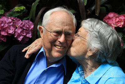 60th anniversary, grandparents, hydrangea, greenhouse, kiss on the cheek, couple