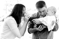 family portraits, professional, "christine lewis photography", pictures, "black and white", parents, one year old, toddler, baby, laughing, tickling, mother, father