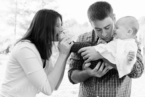 family portraits, professional, "christine lewis photography", pictures, "black and white", parents, one year old, toddler, baby, laughing, tickling, mother, father