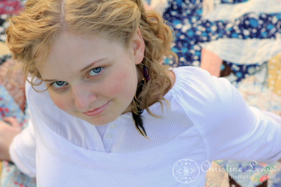 chattanooga, tennessee, senior portraits, home school, christine lewis photography, curly, blonde, girl, female, photographs, from above, quilt, family heirloom