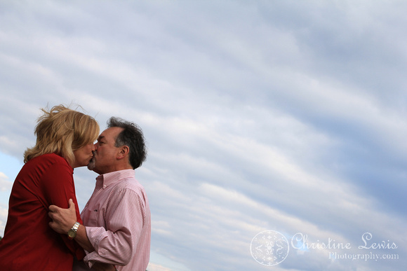 couple, engagement, chattanooga, tennessee, tn, portraits, professional, photographs, pictures, kissing, blue sky, clouds, artistic